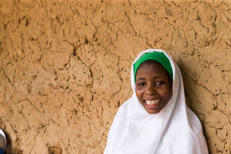 NIgerian girl smiling.